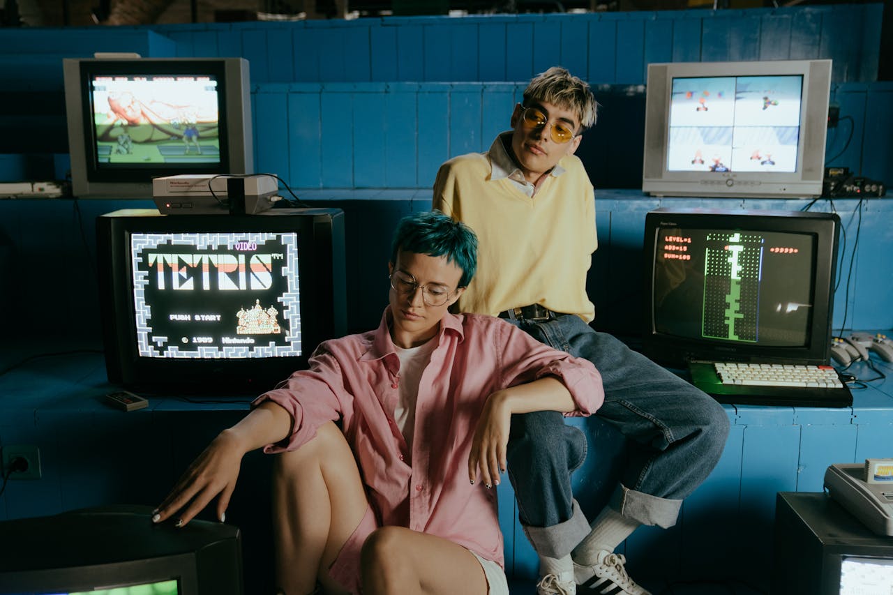 about-03 Teenagers enjoying retro video games in a vintage arcade setting, wearing colorful outfits.